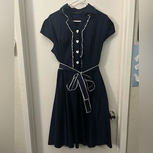 Vintage style blue dress with white heart buttons